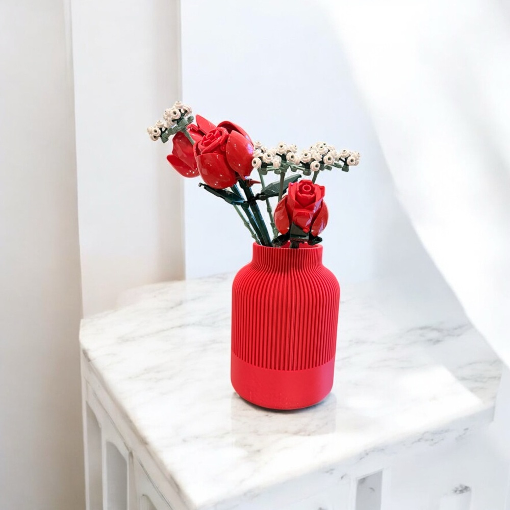 Elegant Red Vase with Artificial Flowers